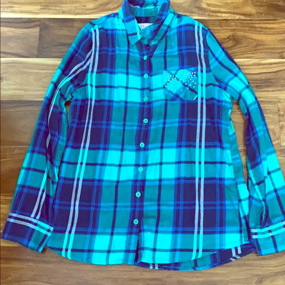 A green and blue flannel from justice